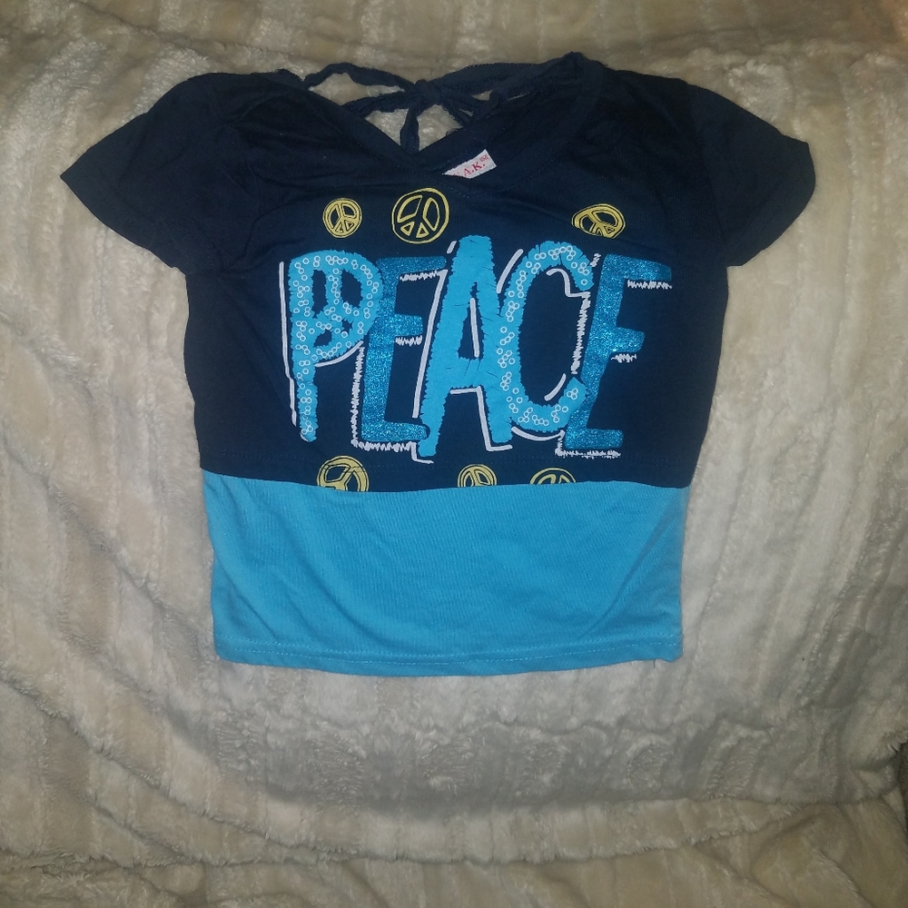 S.W.A.K. size 5/6 peace top